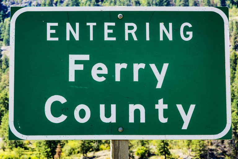 The highway sign for Ferry County, Washington