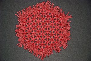 Cloth trivet woven on a hexagonal loom