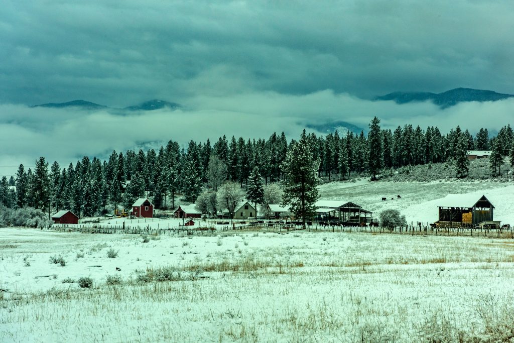 a ranch in a snowy landscape