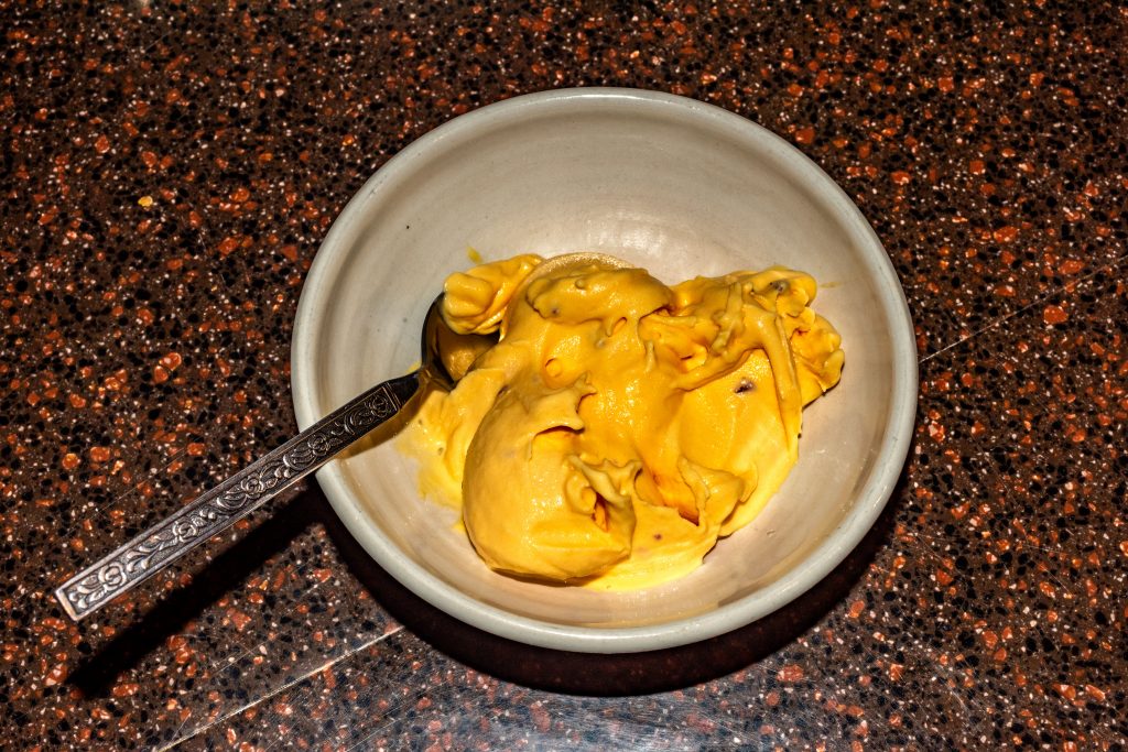 A dish of homemade Mango/Nectarine Sour Cream Ice Cream

