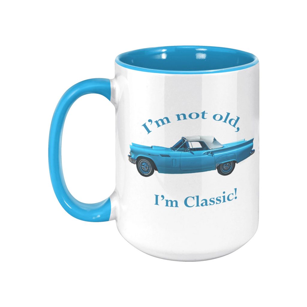 A white ceramic  showing a blue 1957 Ford Thunderbird.