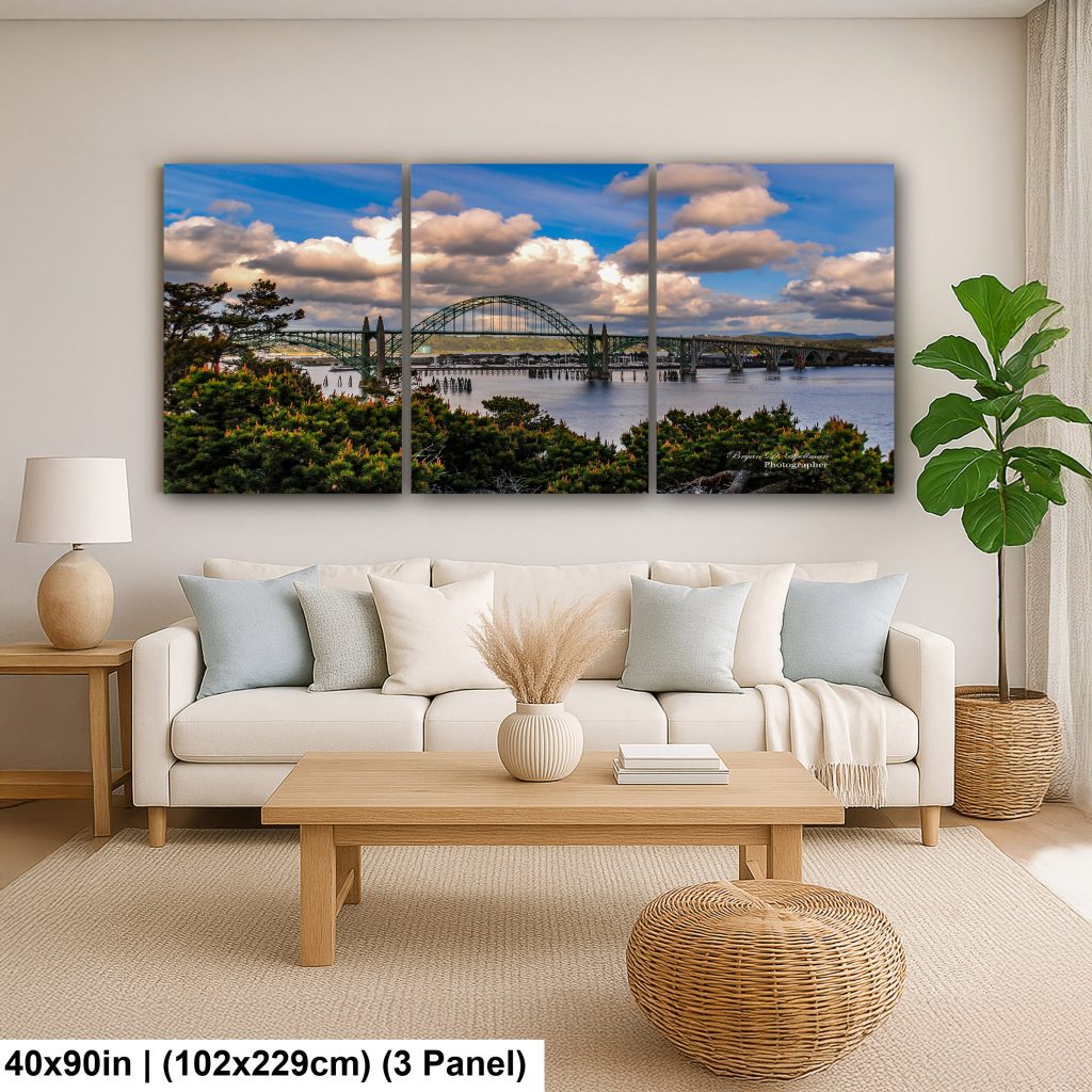 The Yaquina Bay Bridge as a 40x90 inch triptych hangng in a contemporay living room.